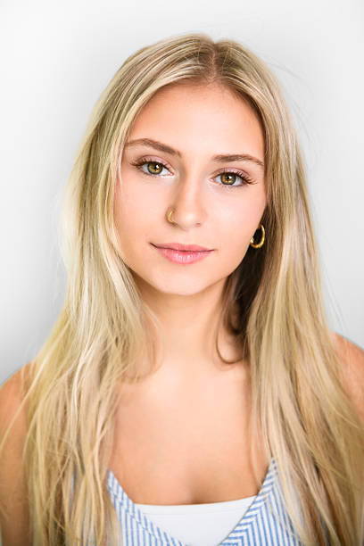 istock Pretty 18 years old blonde girl posing in studio 2243601368