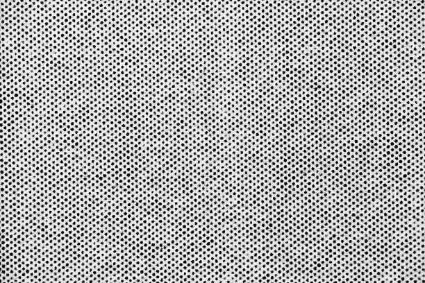 Macro Image of Evenly Spaced Halftone Dots on White Paper
