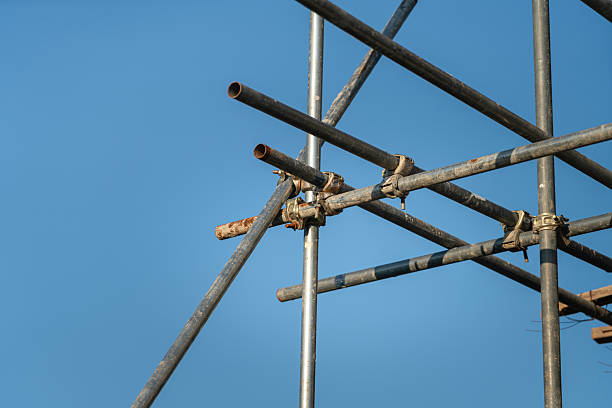 istock Connection joint of working platform scaffold at the house building site. 2243610837