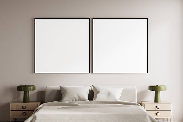 istock Modern bedroom interior with two blank vertical posters above bed in minimalist setting with neutral tones and green lamps on wooden nightstands.. 3D Rendering 2243611520