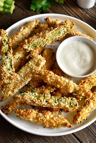 istock Crunchy zucchini breaded sticks with dip sauce 2243612309