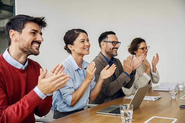 istock Business people applauding during successful meeting conference 2243620156