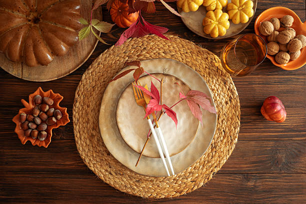 istock Festive Autumn Table Setting with Ceramic Plates, Pumpkins, Cake and Rustic Decor 2243622138