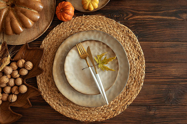 istock Festive Autumn Table Setting with Ceramic Plates, Pumpkins, Cake and Rustic Decor 2243622179