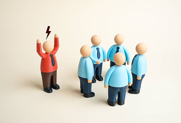 istock The boss is upset that his subordinates are spending all their time talking and not working 2243622299