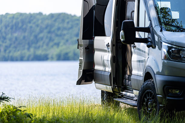 Van Life, Camper van Parked Close to a lake During Summer, The Laurentian Mountains, Quebec, Canada.