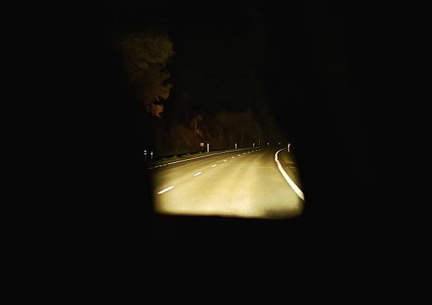 istock Road at night seen from car 2243625720
