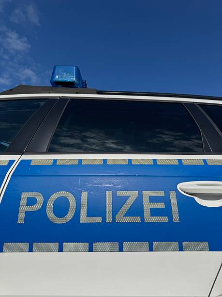 istock Blue and white police car with a blue stripe on the side 2243627763