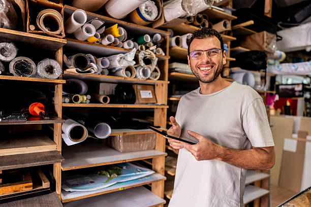 istock Portrait of a print shop worker checking tablet for orders 2243642562