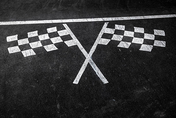 A grayscale watercolor-inspired checkered flag with irregular edges and splattered textures, evoking vintage sport visuals. Suitable for themes of competition, nostalgia, decay, and bold design contrast.