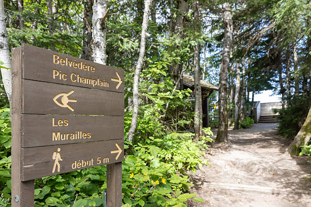 Bic National Park, Quebec, Canada - August 4, 2025: Sentier Le Pic Champlain and Les Murailles hiking trails post in National Park managed by la Société des établissements de plein air du Québec (Sépaq).