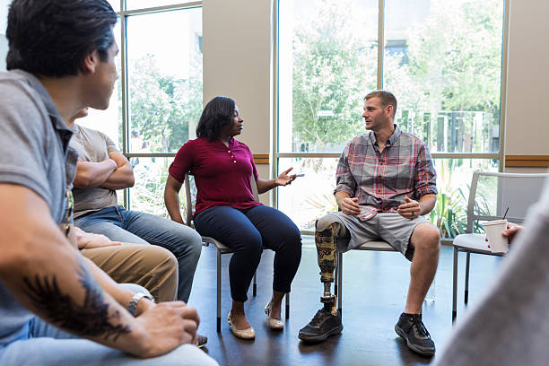istock Diverse group in circle, engaging in conversation and mutual support, overcoming challenges together. 2243660500