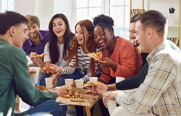 istock Pizza Party Fun at Home with Friends 2243665988