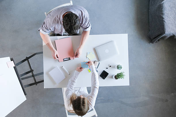 istock couple working in the office or from home 2243666385