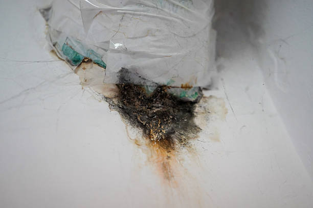 istock Moldy and stained wall surface showing signs of humidity damage 2243667880
