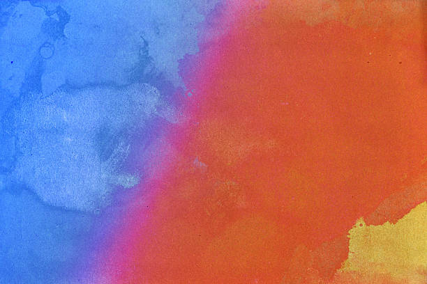 istock Mottled blue, red, yellow mx waterpaint background texture on rough paper 2243668963