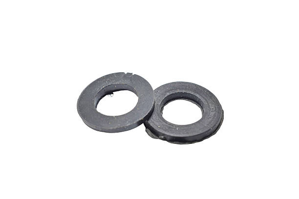 istock Two paronite gaskets for taps and mixers. 2243670484