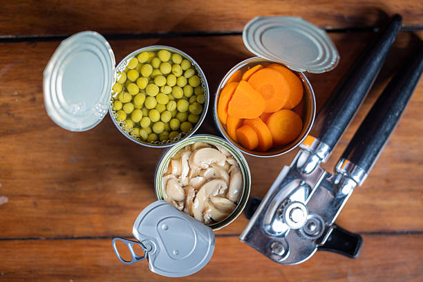 Close up of cans of food as a concept for National Canned Food Day.