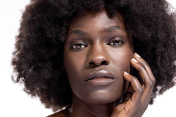 istock Beautiful young black woman posing against a white background 2243680985