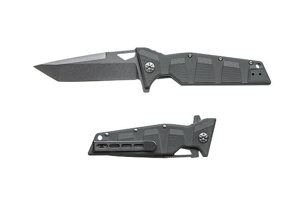 istock Tactical folding knife with a grey handle and blade, isolated on a white background. 2243683869