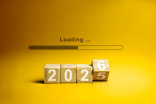 istock Loading bar with wooden cubes transform from the number 2025 to 2026 on a yellow background. Happy New Year concept or Celebration 2243690085