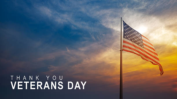 Message of Veterans day with american flag background. Concept of Veteran day, Memorial Day or patriotism stock photo