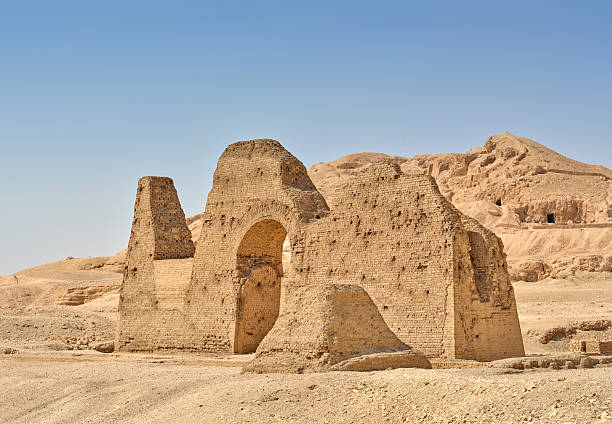 istock Ancient Ruins of a Desert Structure with Arches and Mountains 2243694484