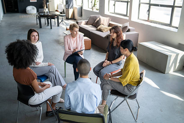 istock Diverse team of professionals collaborating in modern office meeting 2243697491