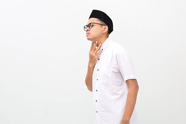 istock Asian muslim man feeling thirsty while touching his throat 2243697650