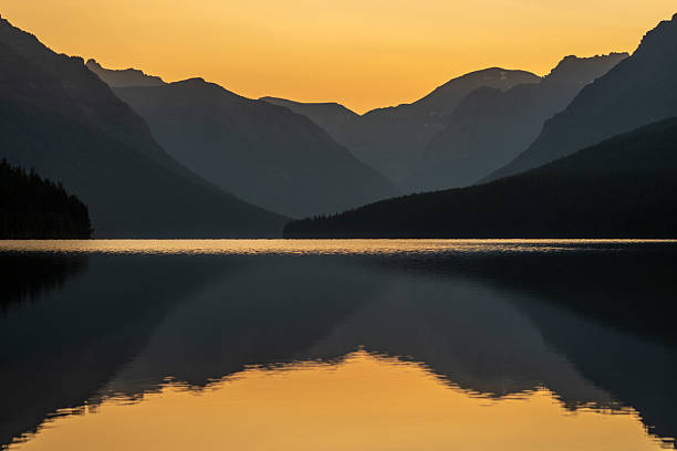 istock Orange Glow Engulfs Bowman Lake In Glacier 2243699679