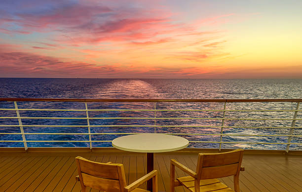 istock Sunset over the ocean from a cruise ship 2243702681
