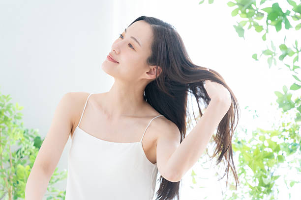 istock young woman doing beauty care 2243702724