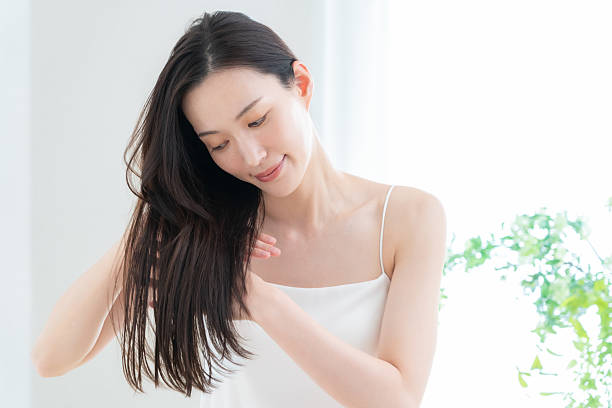 istock young woman doing beauty care 2243702729