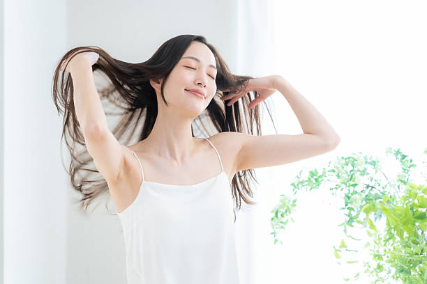 istock young woman doing beauty care 2243702733