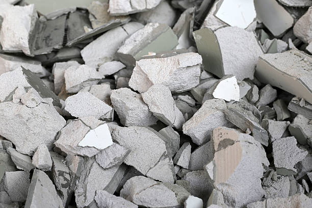 istock Broken concrete, Piles of lightweight construction bricks after house demolition 2243703868