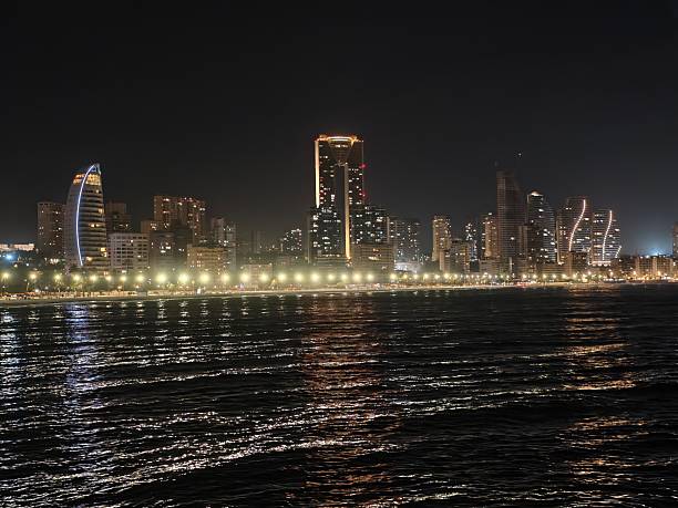 istock bright skyline silhouette, distinctive vertical shape dominates horizon with shimmering waterfront 2243704418
