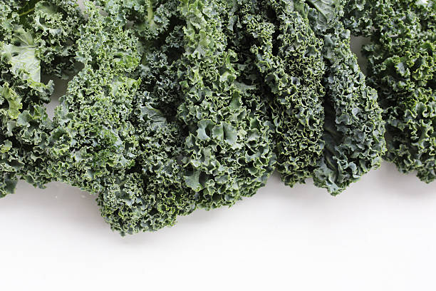 istock Curly kale leaves, Fresh green vegetables 2243704458