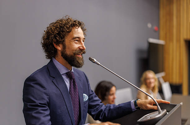 istock Man speaker presenting speech at business conference 2243718537