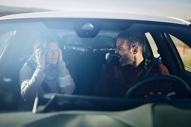 istock Frustrated couple arguing during a trip in a car. 2243734436
