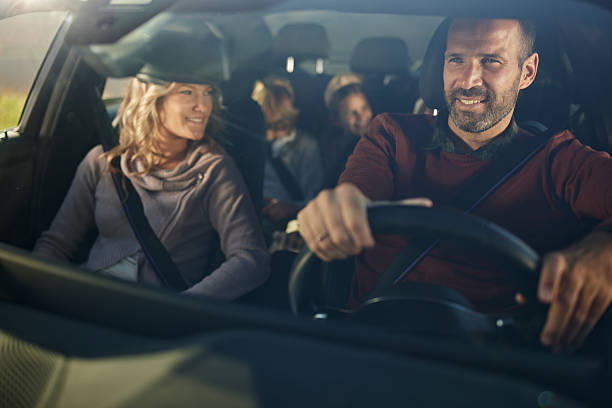 istock Happy family going on a road trip by car. 2243734483