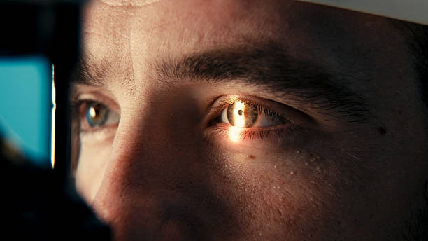 istock Male patient undergoing detailed vision examination with advanced ophthalmic equipment 2243734721