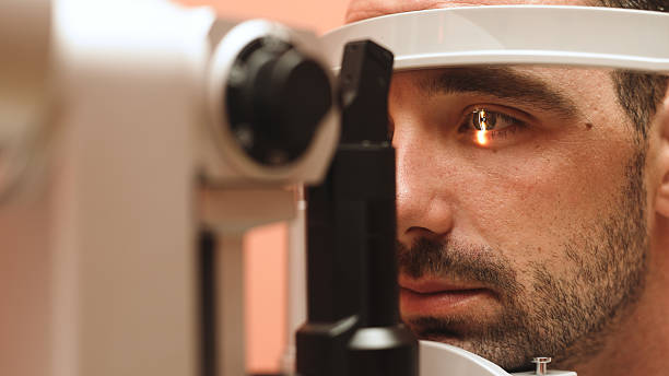 istock Male patient undergoing detailed vision examination with advanced ophthalmic equipment 2243734766