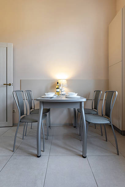 istock Modern Minimalist Dining Room with Lamp and Table Setting 2243735693