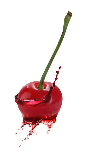istock Fresh cherry with juice against white background 2243735969