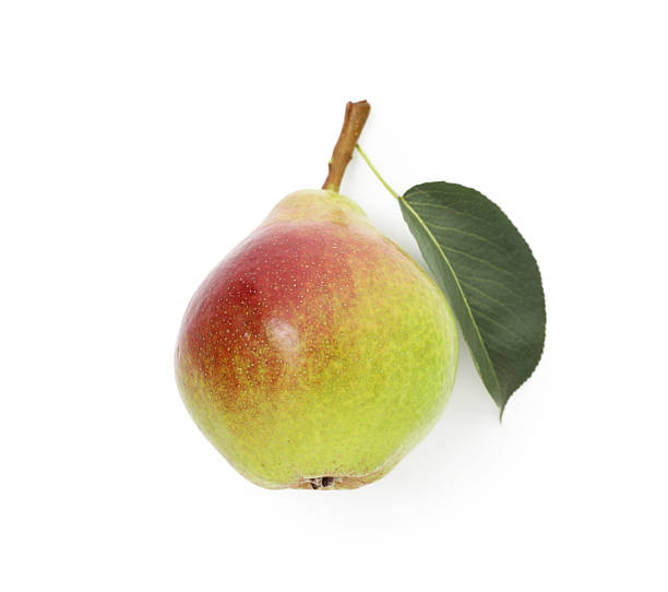 istock Whole ripe pear with leaf isolated on white, top view 2243736333