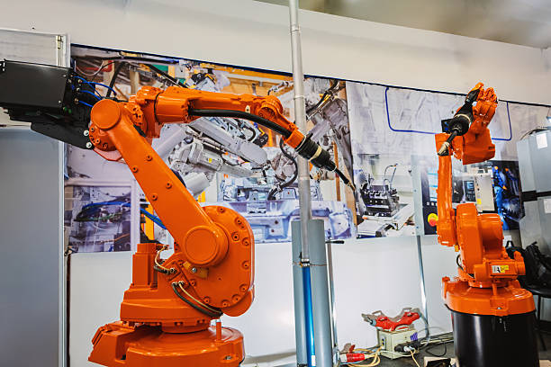 istock Robotic Arms Display Precision and Efficiency in a Modern Industrial Automation Showcase Setting and Production 2243738459