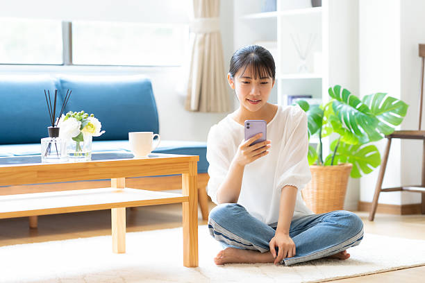 istock young woman relaxing at home 2243738615
