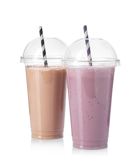 istock Milkshakes of different flavors in plastic cups isolated on white 2243741848