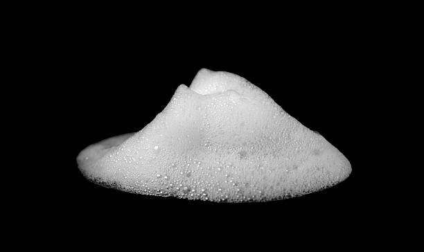 istock White soap foam bubble isolated on black background, realistic cleaning foam texture for hygiene product design, freshness concept, skincare advertising, or cleanliness presentation element. 2243742400