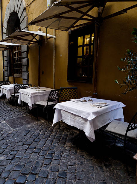 istock Italian street with cafe 2243743516